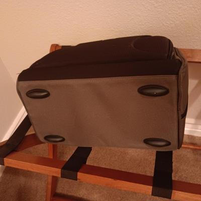 CASE LOGIC SUITCASE ON 2 WHEELS AND CARRY-ON PLUS A FOLDING LUGGAGE RACK