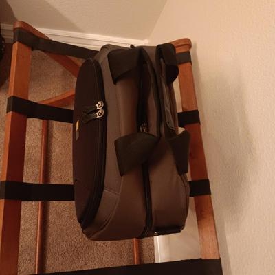 CASE LOGIC SUITCASE ON 2 WHEELS AND CARRY-ON PLUS A FOLDING LUGGAGE RACK