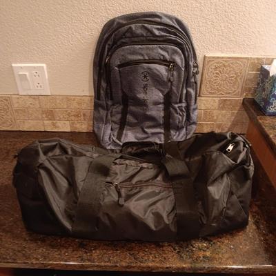 BABY LOCK CANVAS BAG ON 2 WHEELS, BACKPACK AND 2 SMALLER DUFFLE BAGS