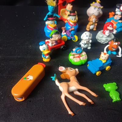 A LARGE GROUP OF SMALL TOYS