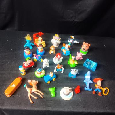 A LARGE GROUP OF SMALL TOYS