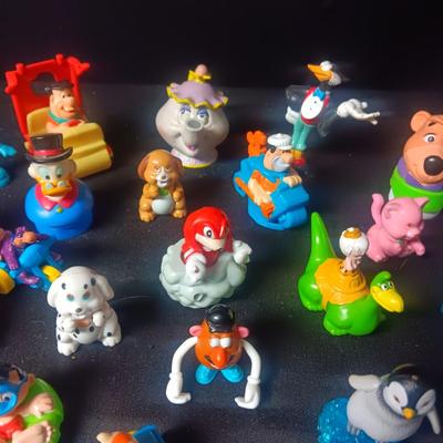A LARGE GROUP OF SMALL TOYS