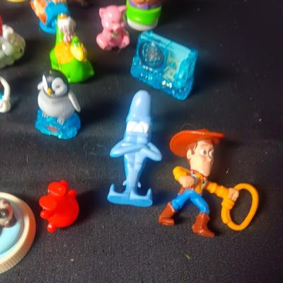 A LARGE GROUP OF SMALL TOYS