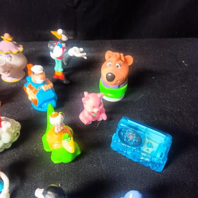 A LARGE GROUP OF SMALL TOYS