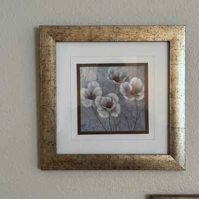 2 GOLD FRAMED FLORAL PICTURES AND A CLAY WALL POCKET
