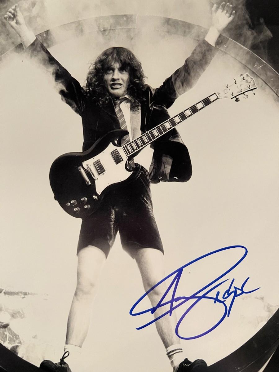 AC/DC Angus Young signed photo | EstateSales.org
