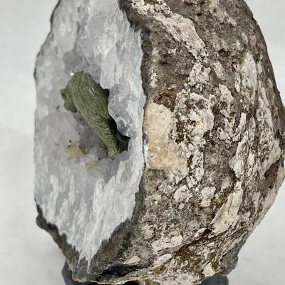 Half of a large Geode with bear figurine inside Crystal with stand attached to bottom