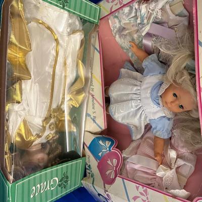 Tote of Various Dolls in Boxes