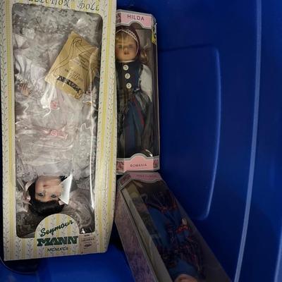 Tote of Various Dolls in Boxes