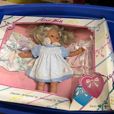Tote of Various Dolls in Boxes