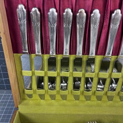 WM Rogers Silver Plated Set of Service for 12 with some serving. 