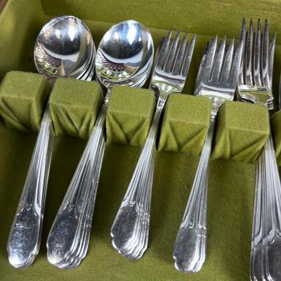 WM Rogers Silver Plated Set of Service for 12 with some serving. 