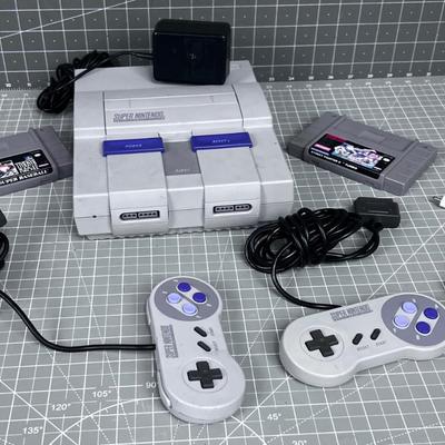 Super Nintendo Console with 2 Games