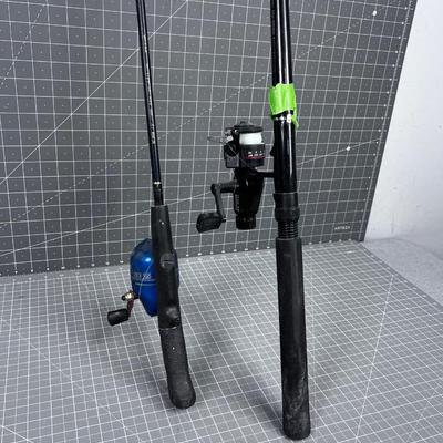2 Fishing Poles, 1 Open Faced and 1 Closed Face