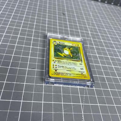 Pokémon RAICHU In Protector Sleeve 