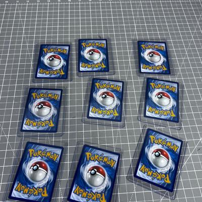 Pokémon (9) Cards, In Protector Sleeve 