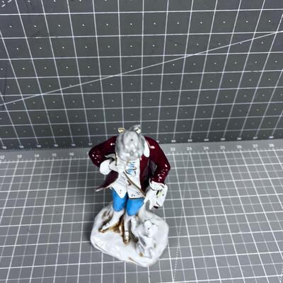 Japanese Porcelain Figurine Man with Puppy