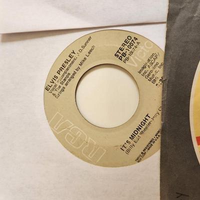 Collection of Elvis 45RPM Records