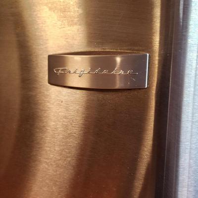 Lot #124 Frigidaire Stainless Steel Refrigerator - works