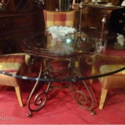LOT 90: METAL AND GLASS DINING SET, 4 MODERN CHAIRS, SCROLLING METAL BASE TABLE