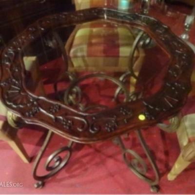 LOT 90: METAL AND GLASS DINING SET, 4 MODERN CHAIRS, SCROLLING METAL BASE TABLE