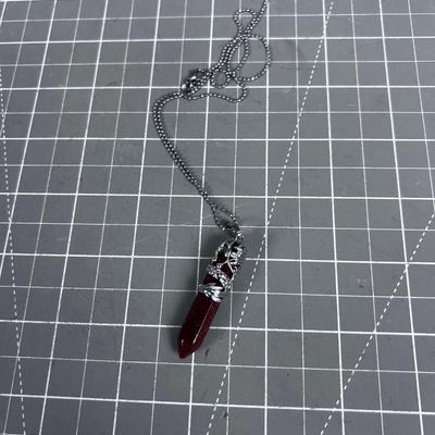 Gold Stone Rust Colored Pointer Crystal in a Dragon Pendant 