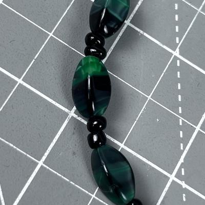 Green and Black Cat Eye Like Necklace