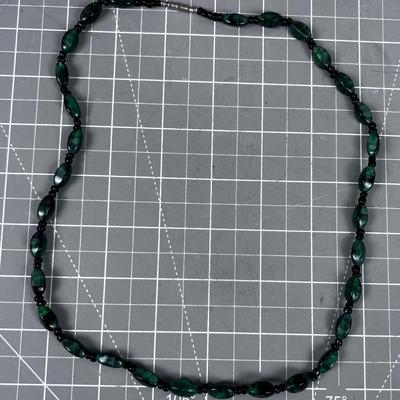 Green and Black Cat Eye Like Necklace