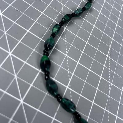 Green and Black Cat Eye Like Necklace