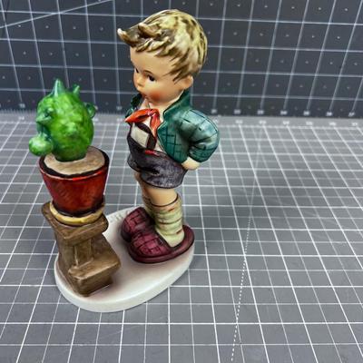 HUMMEL Titled: Confidentially  Boy and a Plant