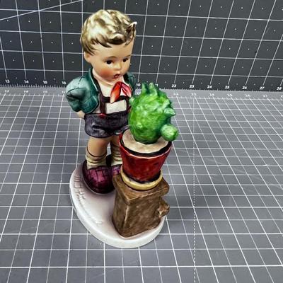 HUMMEL Titled: Confidentially  Boy and a Plant