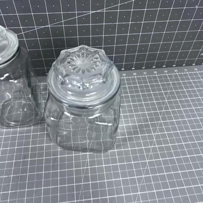 2 Covered Jars