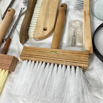 Brushes and magnifying glasses
