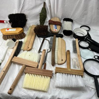 Brushes and magnifying glasses