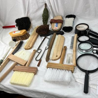 Brushes and magnifying glasses