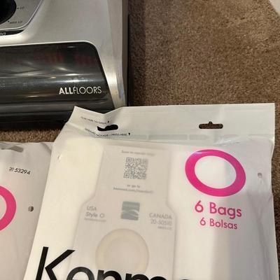 KENMORE ALL FLOORS VACUUM W/DIRT SENSOR AND HEPA FILTRATION PLUS REPLACEMENT BAGS
