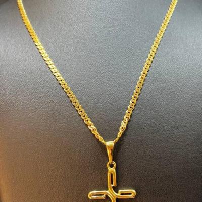 18 k Gold cross and chain 20 in