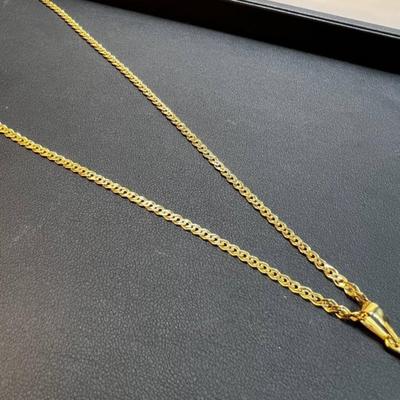 18 k Gold cross and chain 20 in