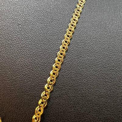 18 k Gold cross and chain 20 in