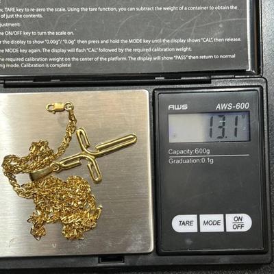 18 k Gold cross and chain 20 in