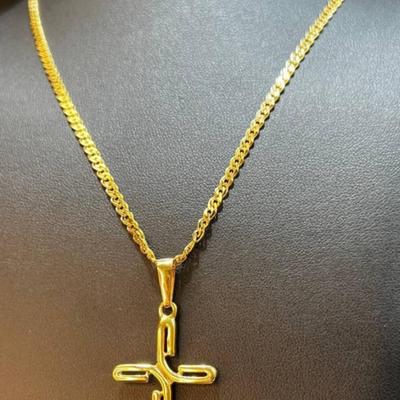 18 k Gold cross and chain 20 in