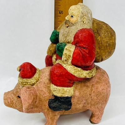 Santa Riding Pig Figurine