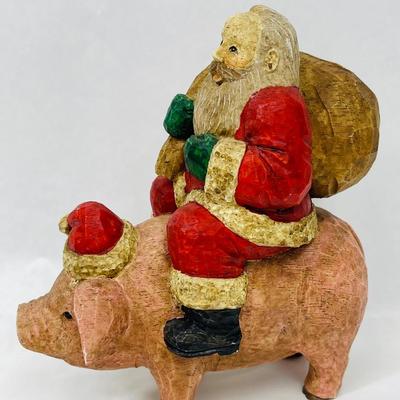 Santa Riding Pig Figurine