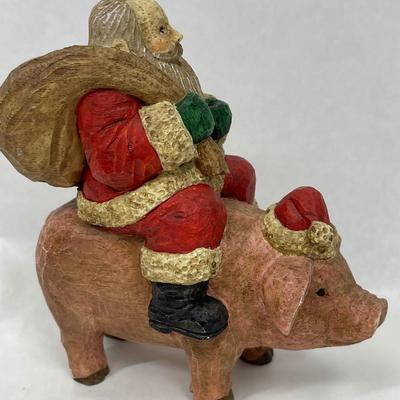 Santa Riding Pig Figurine