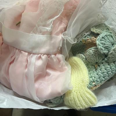 Bag of doll clothes
