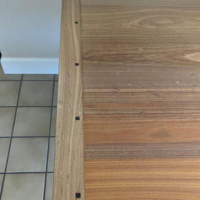 Impressive custom made craftsman style dining room table with unique joinery