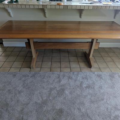 Impressive custom made craftsman style dining room table with unique joinery