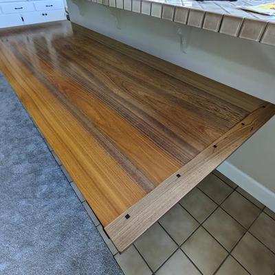 Impressive custom made craftsman style dining room table with unique joinery