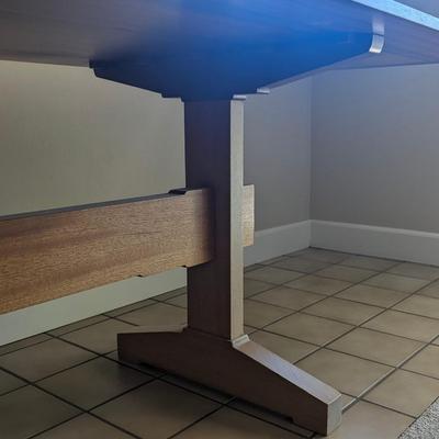 Impressive custom made craftsman style dining room table with unique joinery