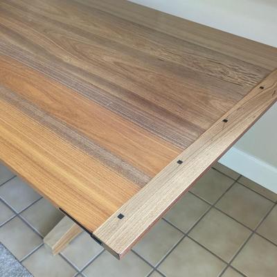 Impressive custom made craftsman style dining room table with unique joinery